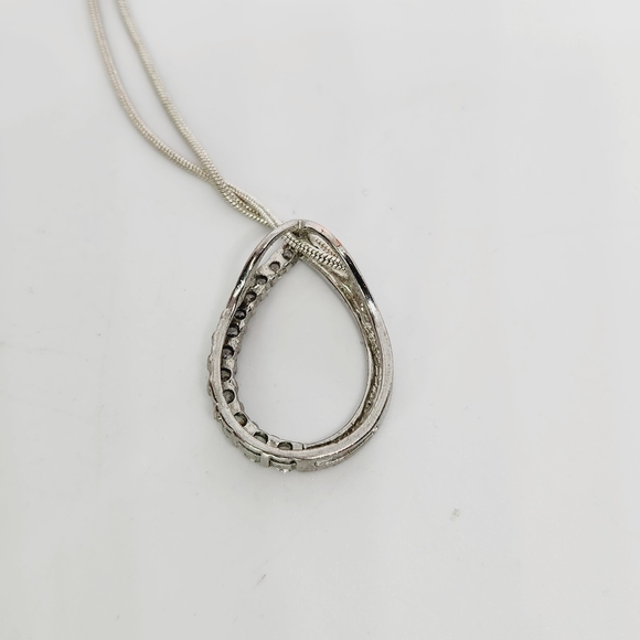 Silver Tone Graduated Cubic Zirconia Open Teardrop Pear Journey Necklace - Picture 5 of 6